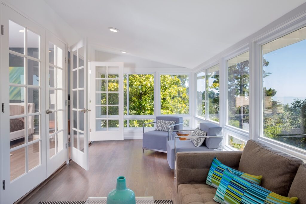 Bright solarium-style sunroom off the master suite